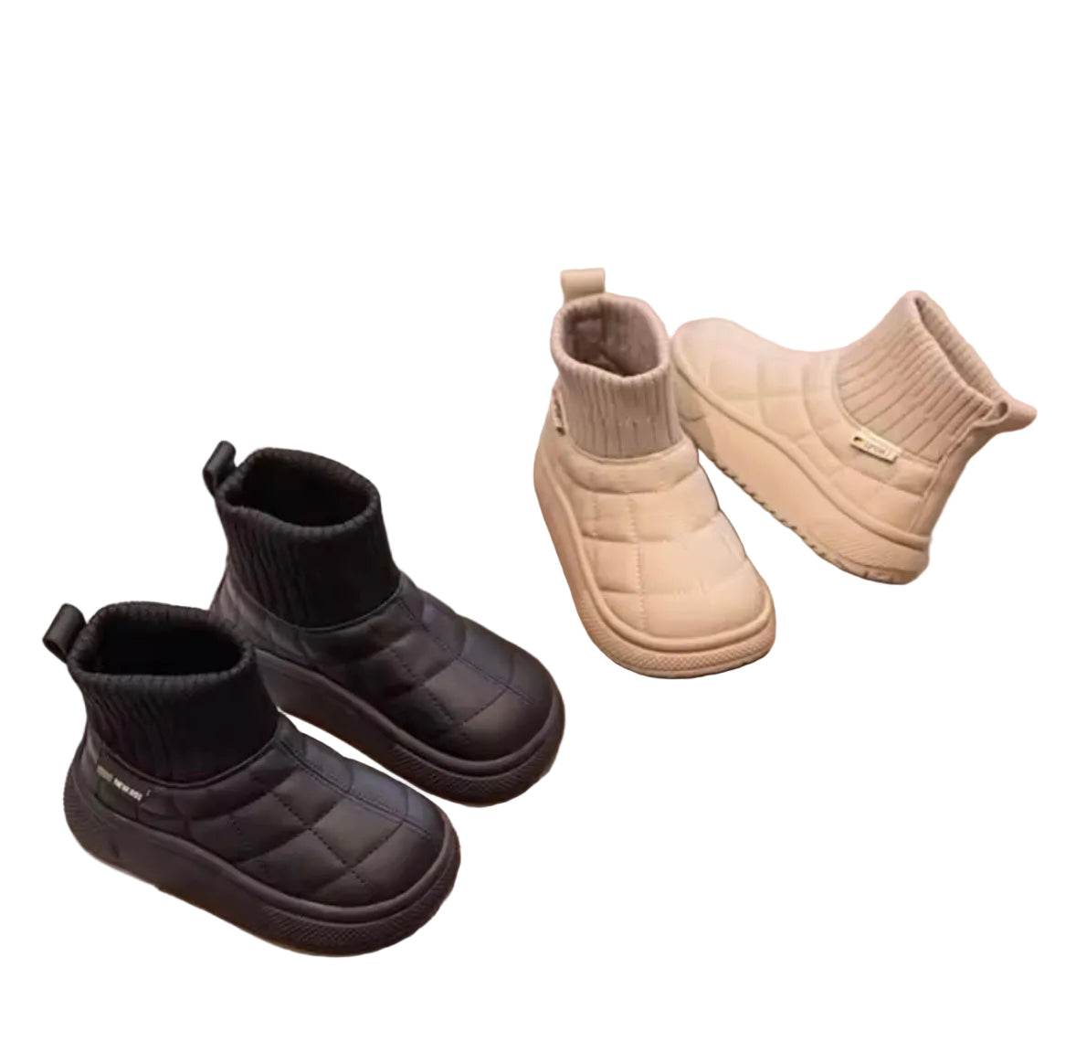 Black and beige winter boots on a light brown surface with a magazine underneath.
