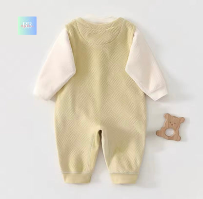 Baby romper with textured pattern on a white background