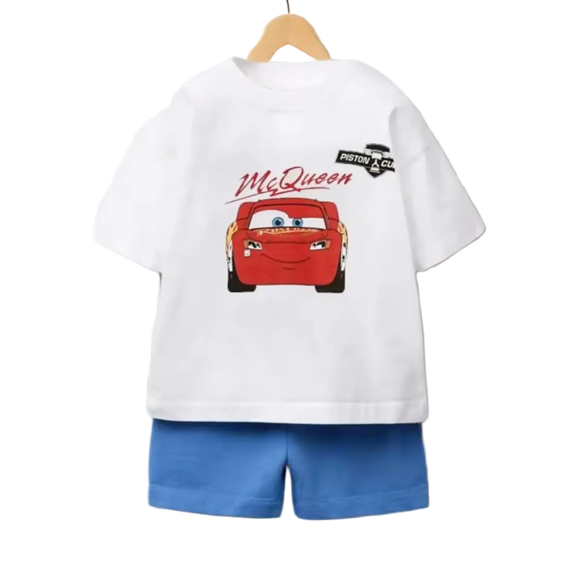 White t-shirt with red car graphic and 'McQueen' text, paired with blue shorts on a hanger.