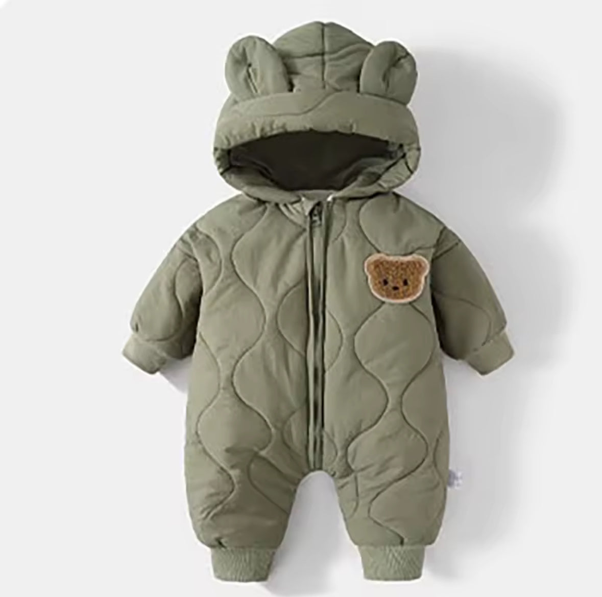 Green baby snowsuit with bear ears and a patch on a white background