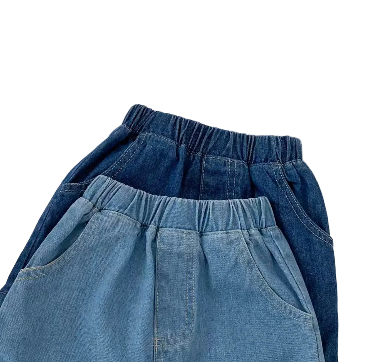 Two pairs of blue denim pants on a white surface.
