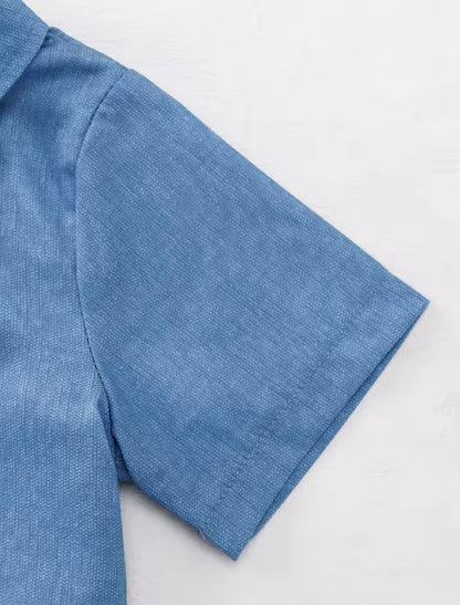 Close-up of a blue fabric edge on a white background