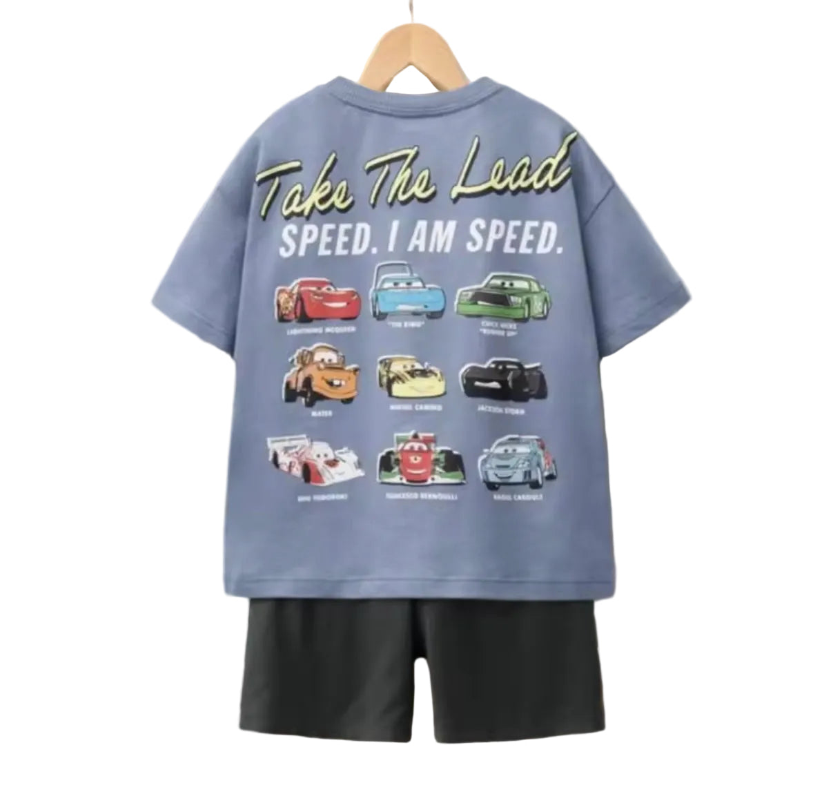 Children's t-shirt with car graphics and text on a hanger against a white background