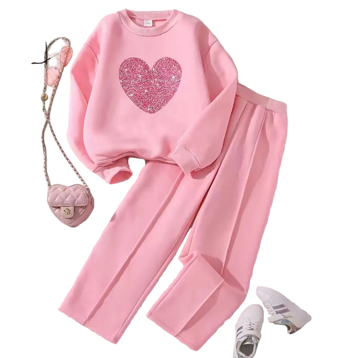 Pink outfit with heart design on a light background