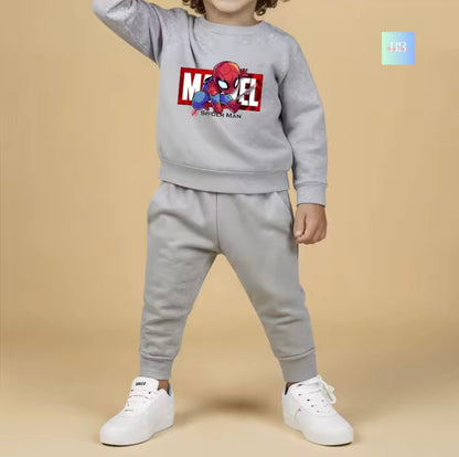 Child wearing a gray Marvel Spider-Man sweatshirt and pants set on a beige background