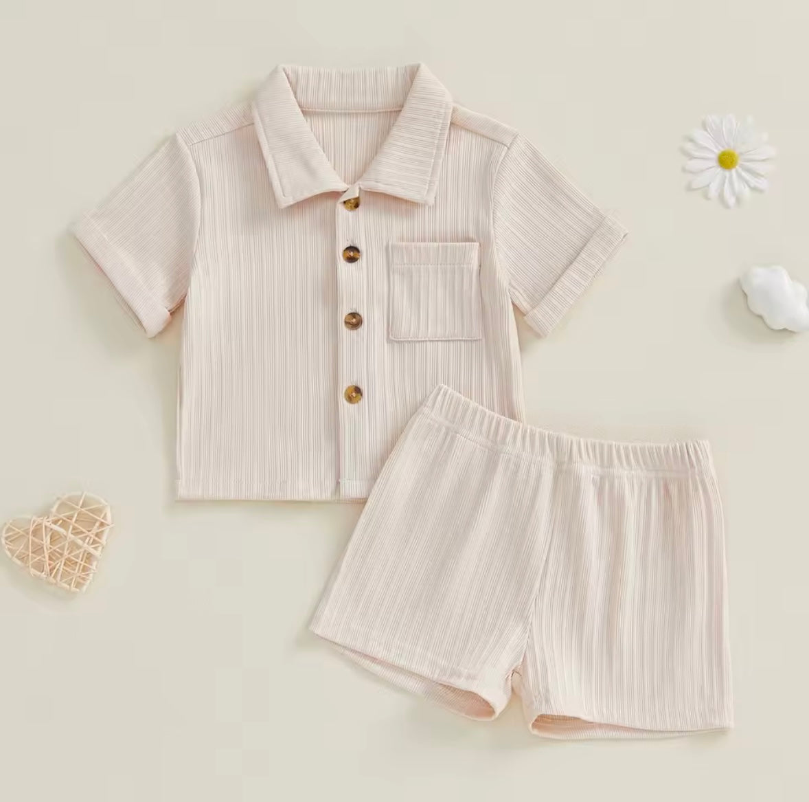 Children's ribbed shirt and shorts set on a light background