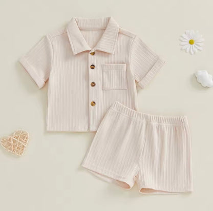 Children's ribbed shirt and shorts set on a light background