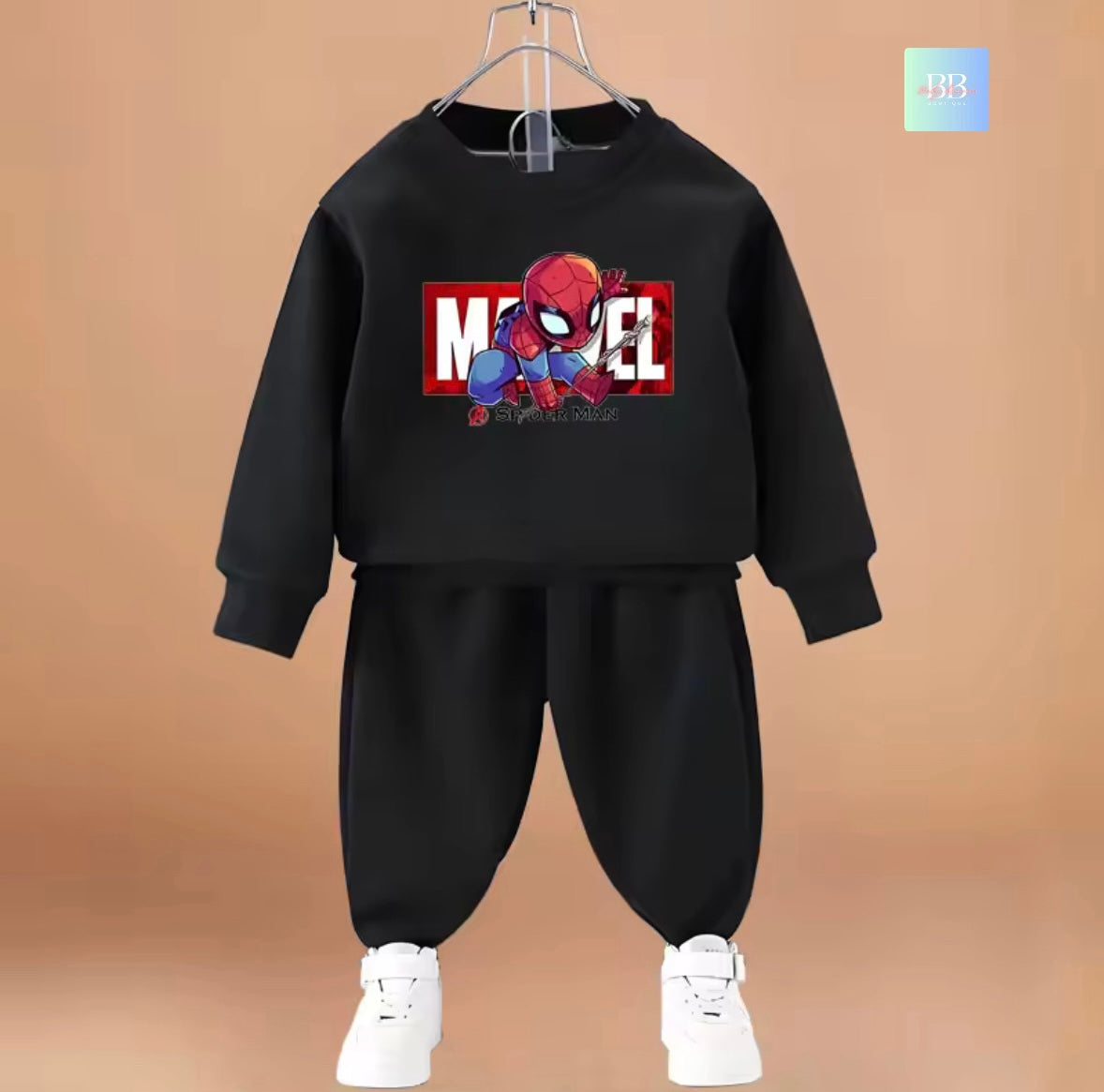 Black children's outfit with Spider-Man graphic on a brown background