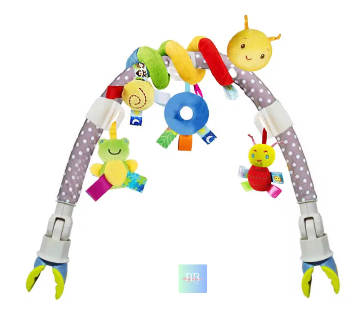 Colorful baby arch toy with various hanging toys on a white background