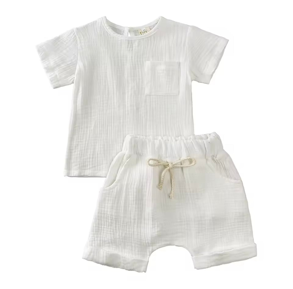 White baby romper with short sleeves and drawstring shorts on a white background