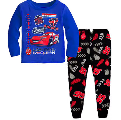 Children's pajama set with blue top and black pants featuring Lightning McQueen design on a white background.