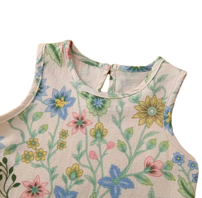 Floral-patterned sleeveless top on a wooden surface