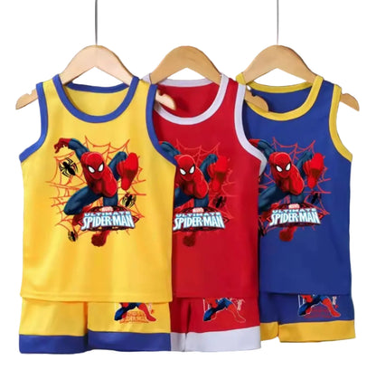 Three children's tank tops with Spider-Man design on hangers against a dark background.