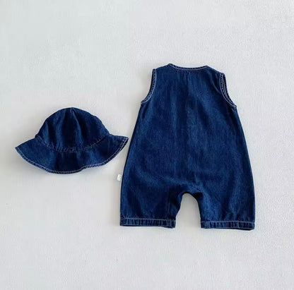 Blue denim romper and hat set on a light gray background