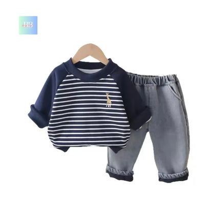 Children's outfit with navy and white striped shirt and gray pants on a hanger against a white background.