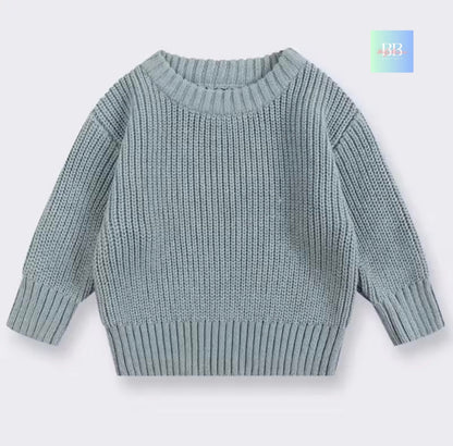 Light blue knitted sweater on a white background