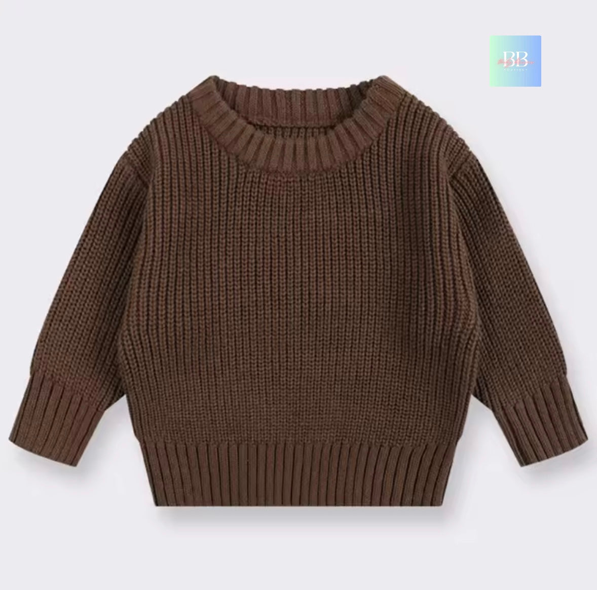 Brown knitted sweater on a light gray background