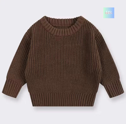 Brown knitted sweater on a light gray background