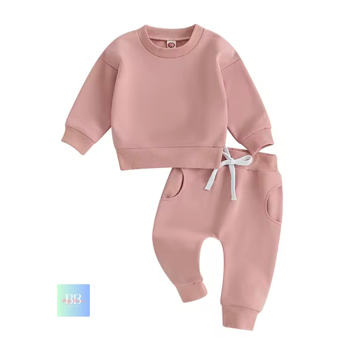 Pink children's sweatshirt and pants set on a white background