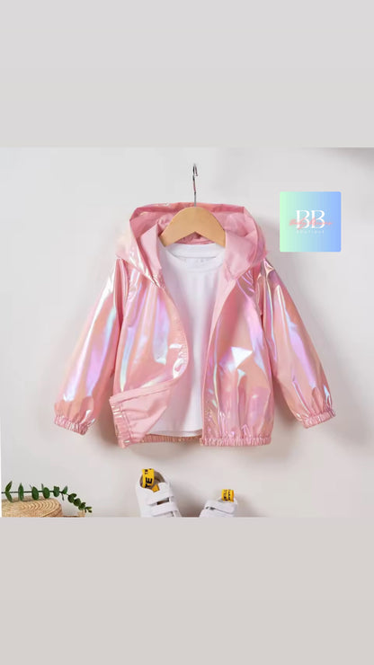 Pink reflective jacket on a hanger against a white background