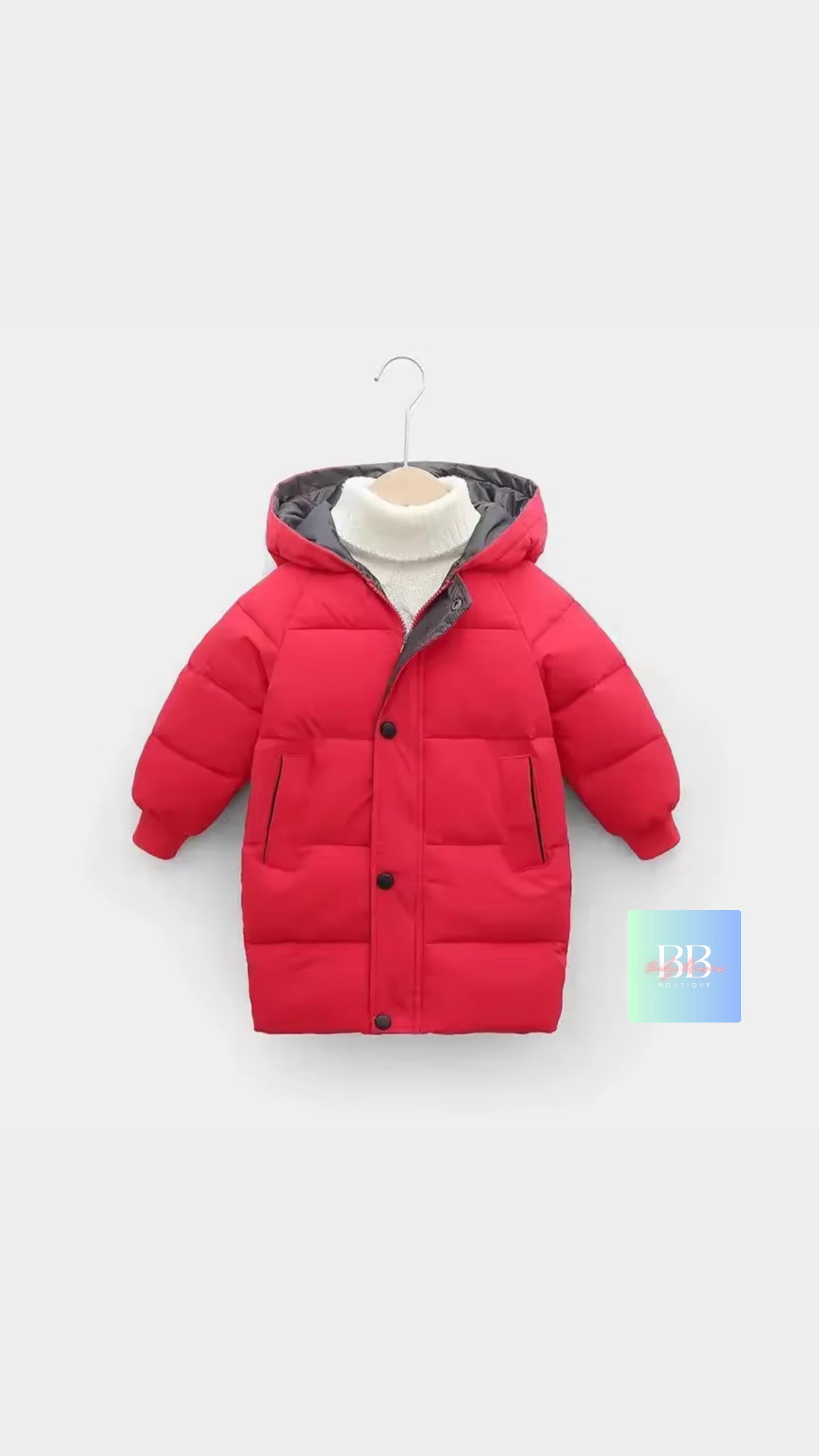 Red children's puffer jacket with a gray hood on a white background