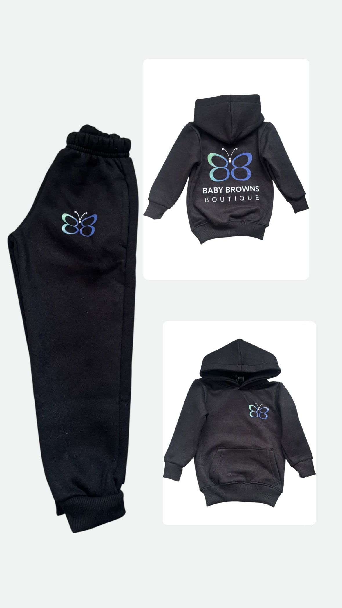 Black hoodie and pants set with butterfly design and text on a white background
