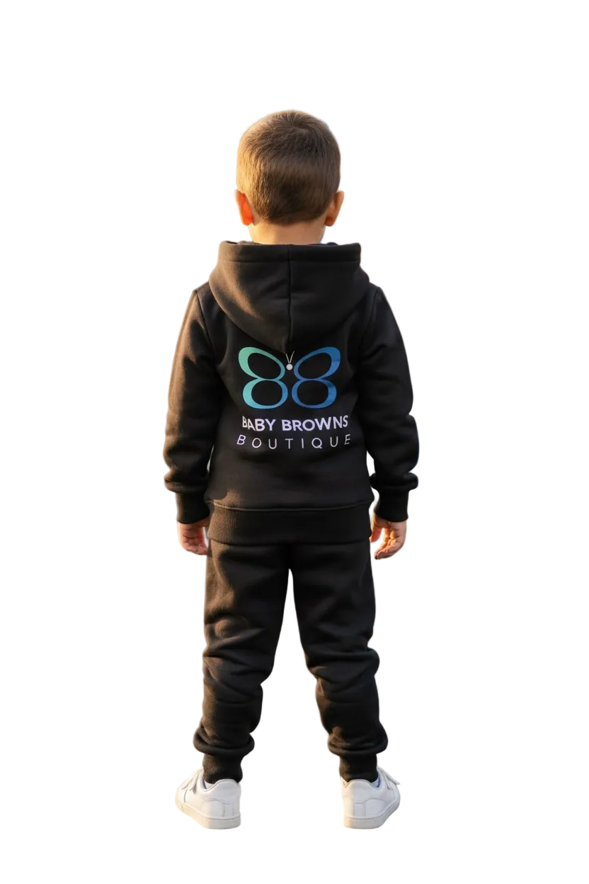 Child wearing a black hoodie with a logo and text, standing against a white background