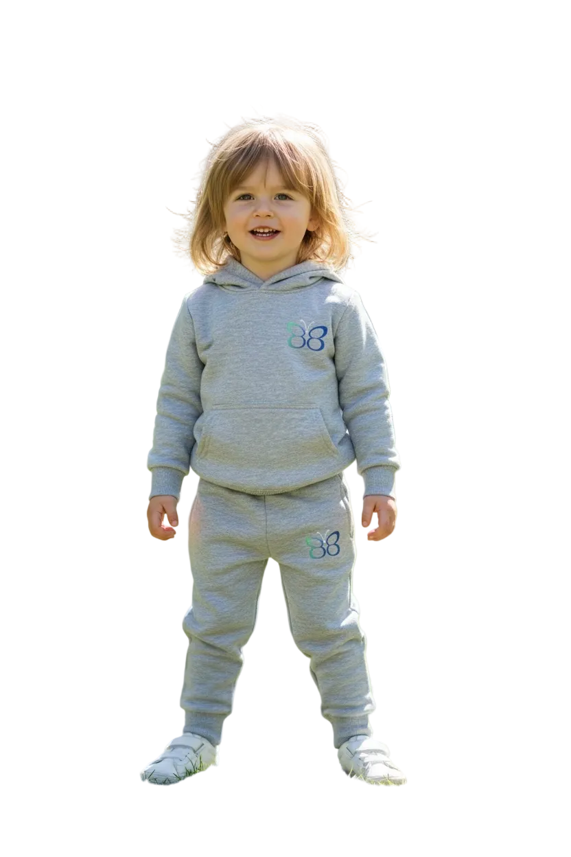 Child wearing a gray hoodie and pants set with a logo on a white background